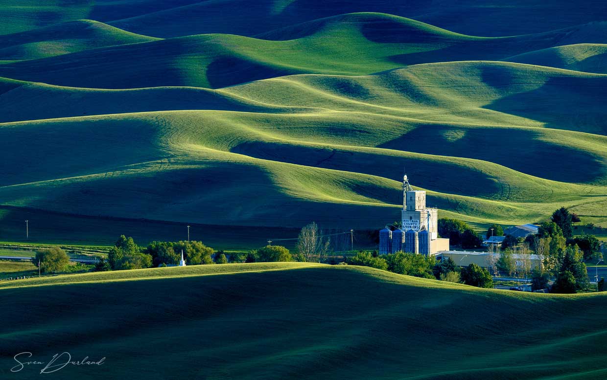 Rolling hills and grain elevator in the Palouse
